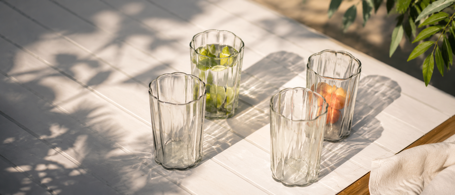 Drinkware arranged for relaxed summer serving